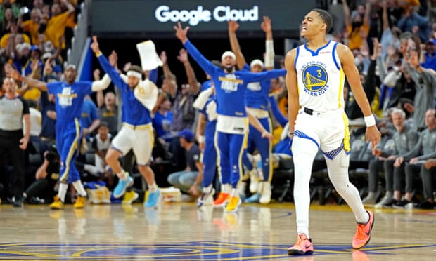 Jordan Poole celebrates after his buzzer beater at the end of the third quarter of the NBA finals’ Game 2