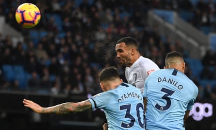 Callum Wilson climbs above two Manchester City defenders to head Bournemouth level just before half-time.