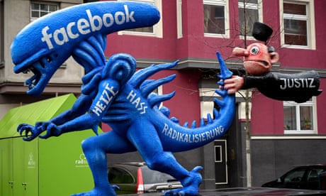 A float depicting hate speech at Facebook shaped like the monster from the movie 'Alien' in Duesseldorf, Germany.
