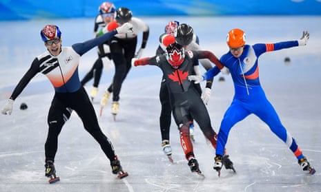 Hwang Dae-heon smiles as he takes gold in the final of the 1500m Short Track Speed Skating.