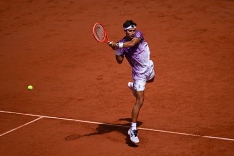 Flavio Cobolli returns during his win over Learner Tien