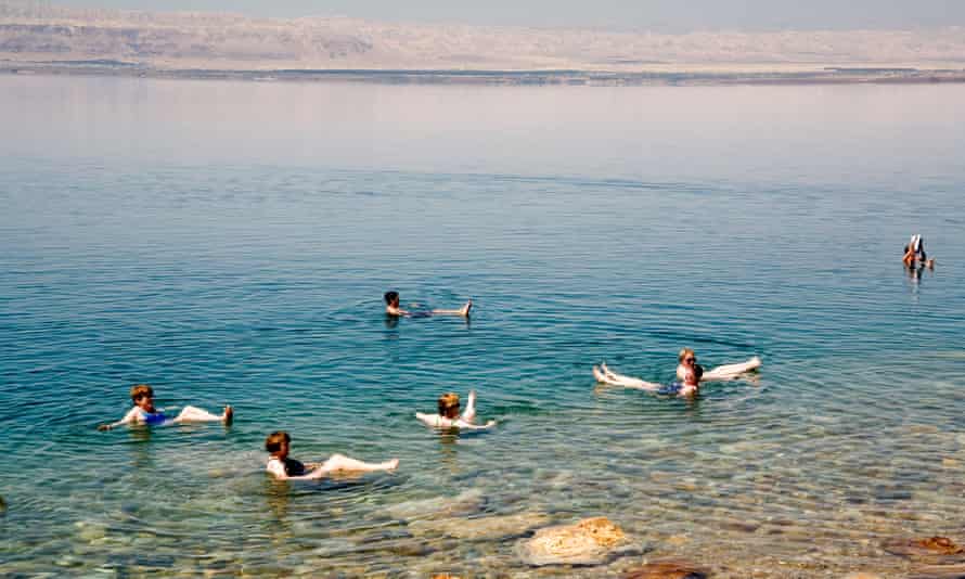 Jordan, Dead Sea, Bathers floating due to high salinity