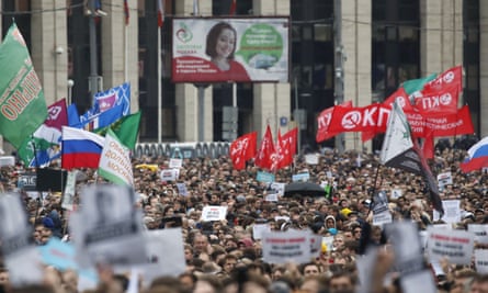 People attend a rally to demand authorities allow opposition candidates to run in a local election in Moscow.