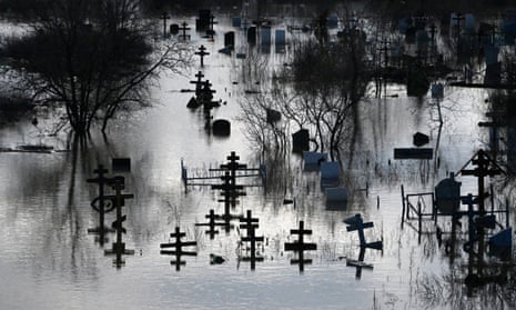 A flooded cemetery after part of a dam burst, in Orsk, Russia.