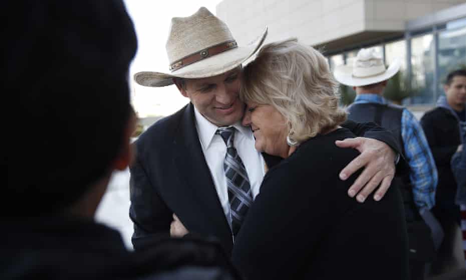 Ammon Bundy hugs is aunt Lillie Spencer outside a federal courthouse in Las Vegas on 20 December. All charges were dismissed Monday. 