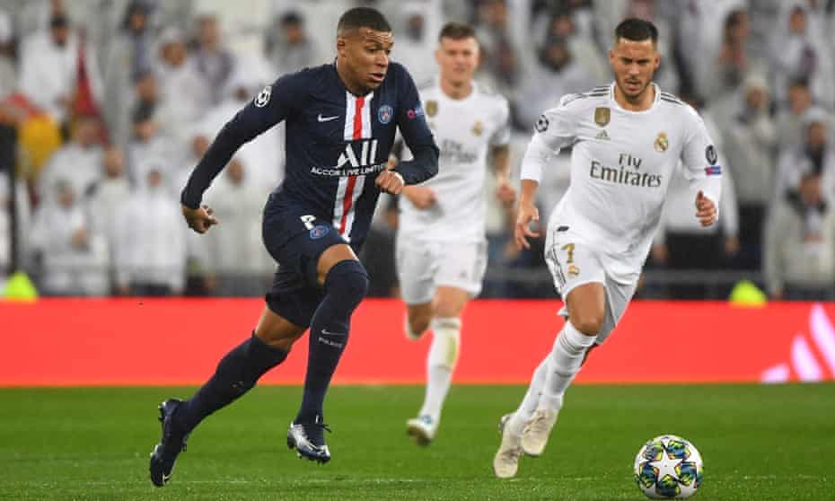 PSG’s Kylian Mbappé takes on Real Madrid’s Eden Hazard in the Champions League.