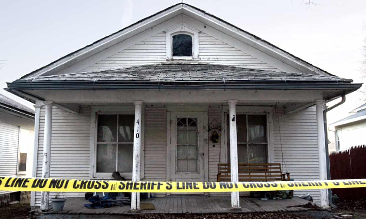 Stinnett's home with police tape