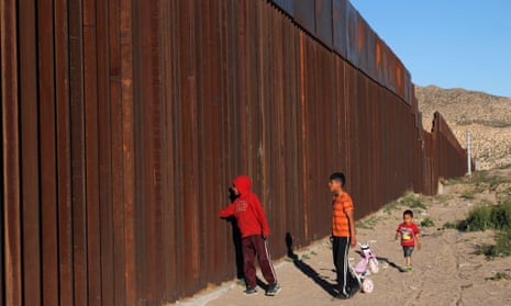 Children on the outskirts of Ciudad Juárez, Mexico, at the border fence with the US.