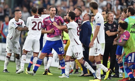 Leonardo Bonucci (centre) argues with Salernitana players in chaotic scenes at the end of the 2-2 draw in Turin.