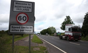 Traffic crossing the border between the Republic of Ireland and Northern Ireland in the village of Bridgend, Co Donegal.