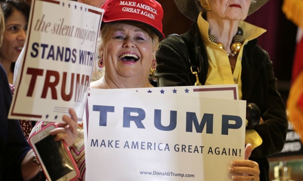 A Trump supporter wears a hat with his campaign slogan: ‘Make America Great Again’.