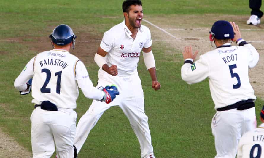 Azeem Rafiq celebrates taking a wicket for Yorkshire flanked by England’s Joe Root and Jonny Bairstow in 2012
