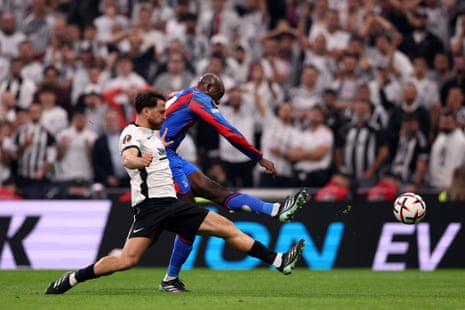 Mateta of Crystal Palace strikes the ball as a Besiktas defender slides in to block