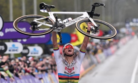 Mathieu van der Poel celebrates after crossing the finish line at the Tour of Flanders