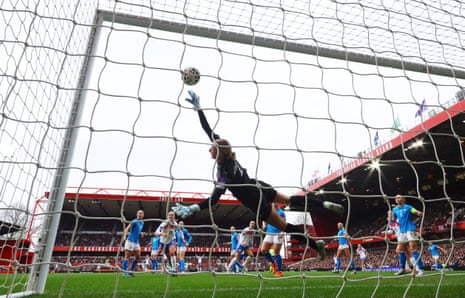 Lucy Bronze plants a header past Iceland keeper Cecilía Rán Rúnarsdóttir to give England the lead.