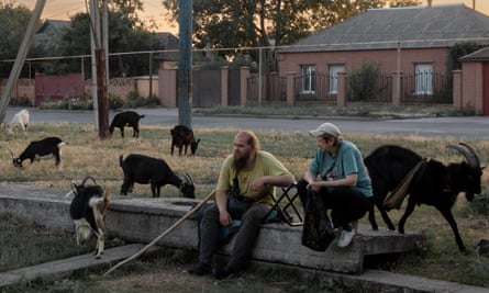 Serhii Rachenko with his goats on the outskirts of Pokrovsk