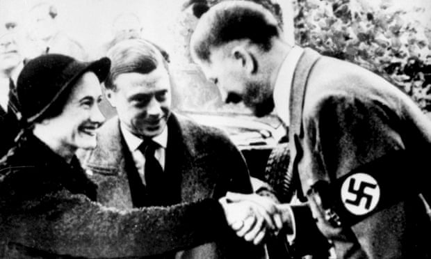 The Duke and Duchess of Windsor greet Adolf Hitler.
