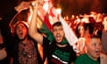Algeria fans in Trafalgar Square in central London celebrate victory against Senegal in the Africa Cup of Nations