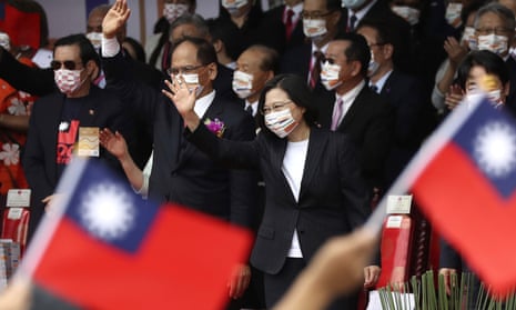 Taiwan’s President Tsai Ing-wen cheers with National Day celebrations, saying she has hopes for less tensions with China and in the region if Beijing will listen to Taipei’s concerns, alter its approach and restart dialogue with the self-ruled island democracy.
