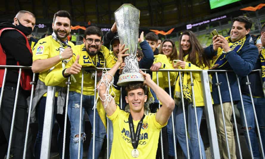 Villarreal’s Pau Torres celebrates with fans after victory in the Europa League final against Manchester United
