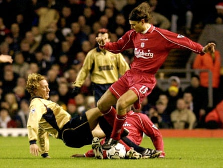 Ray Parlour vies with Liverpool’s Patrik Berger.