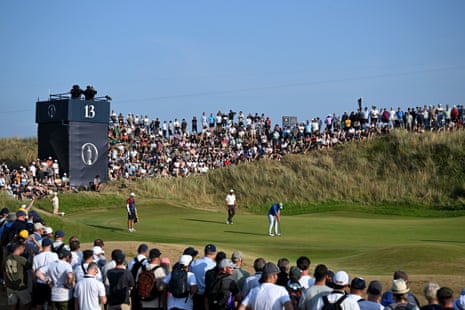 Bryson DeChambeau putts on the 13th green.