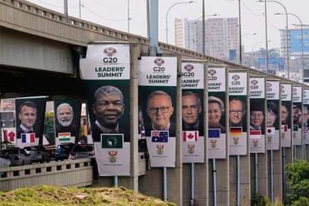 Banners of the leaders attending the summit displayed along a road in Johannesburg