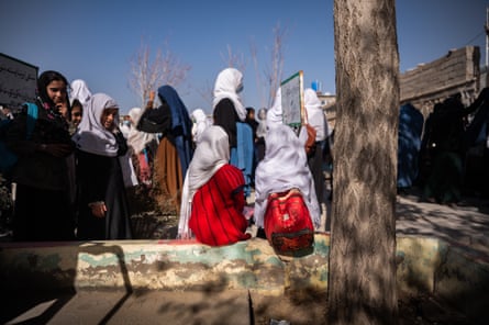 Female students prepare to go home after classes at Bibi Khala girls’ school in Qalat, Zabul. Girls in 7th to 12th grade have to wear a burqa or cover their faces with a niqab when coming to school and going home as part of a compromise reached with the Taliban on how to reopen girls’ schools.