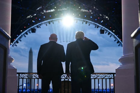Donald Trump and UFC CEO Dana White stand on the Blue Room Balcony of the White House as US military jets perform a flyover.