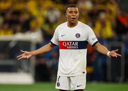 Kylian Mbappé throws out his arms in frustration