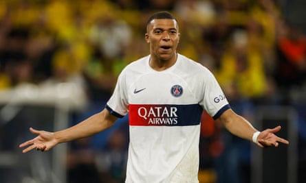 Kylian Mbappé throws out his arms in frustration