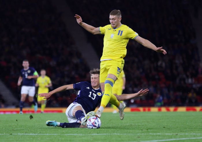 Scotland's Jack Hendry faces Ukraine's Artem Dovbyk.