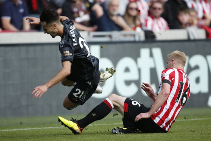 Brentford v Arsenal: Premier League – live | Premier League 7 Vieira is tackled by Mee.