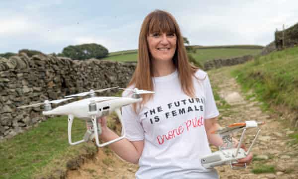 Carys Kaiser, founder of TheDroneLass pictured holding her drones.