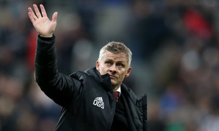 A disconsolate Ole Gunnar Solskjær waves to Manchester United’s travelling fans after their 1-0 defeat at Newcastle
