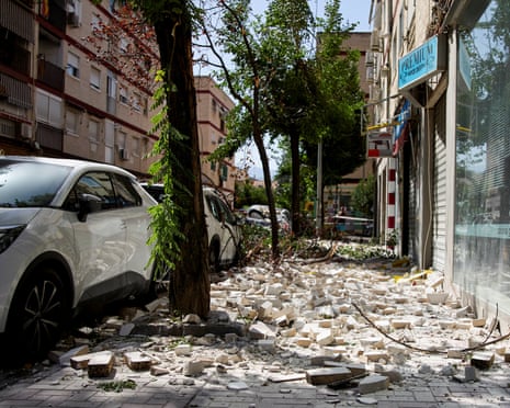 Debris lies scattered on a street in the aftermath of an earthquake that struck southern Spain, in Granada, Spain.