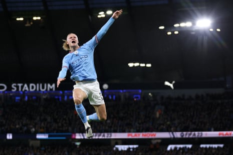 Erling Haaland of Manchester City celebrates after opening the scoring.