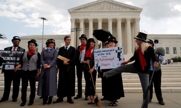 The ‘Kavanaugh Singers’ perform in front of the supreme court promoting the confirmation of nominee Judge Brett Kavanaugh on 8 August.