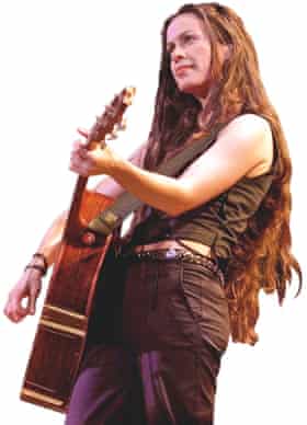 Photograph of Alanis Morissette on stage in 2001.