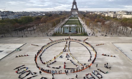 Activists at the Eiffel Tower during Paris COP 2015