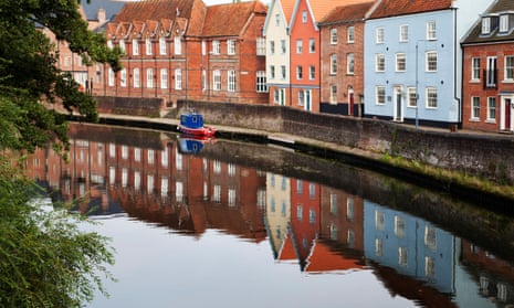 Dreaming streets … quayside buildings reflected in the River Wensum, Norwich.