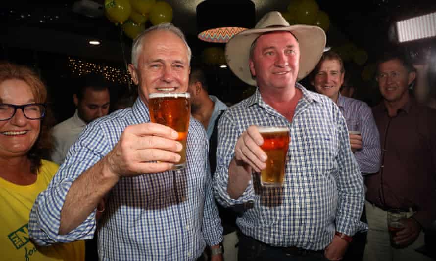 Malcolm Turnbull and Barnaby Joyce toast each other