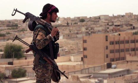 A Syria Democratic Forces fighter in Tabqa, Syria. 