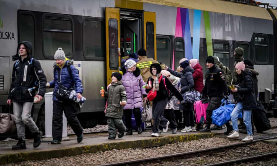 Ukrainian refugees arrive in Medyka, Poland.