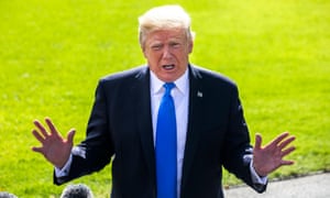 Donald Trump speaks to the media as he departs the White House on Wednesday.