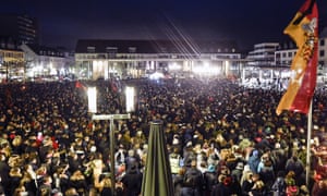 Thousands listen to German president Frank-Walter Steinmeier during a vigil in Hanau for the victims of Wednesday’s shooting.