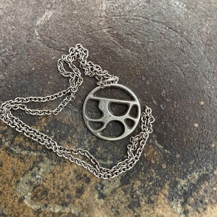 A silver chain and pendant