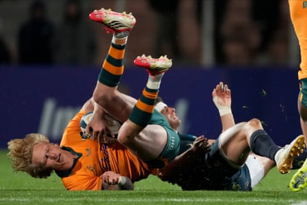 Gordon is tackled by Argentina's Faustino Sanchez Valarolo.