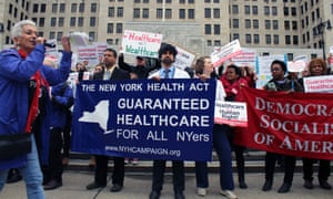 Minerva Solla (far left), an organizer with the New York State Nurses Association, works a crowd of healthcare demonstrators in Albany, New York.