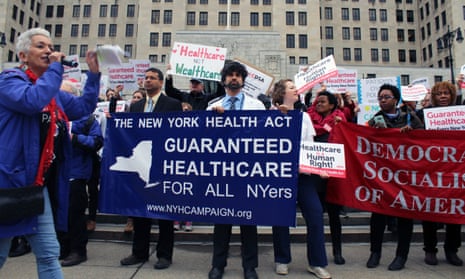 Minerva Solla (far left), an organizer with the New York State Nurses Association, works a crowd of healthcare demonstrators in Albany, New York.